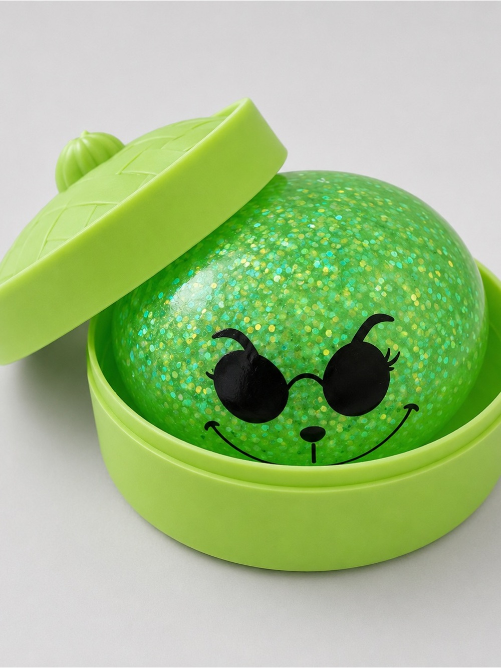 The Grinch Green Glitter Squishy Dumpling with Sunglasses Face & Case
